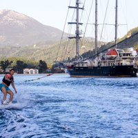 guest wakeboarding near ship 