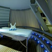 ship interior massage table on the deck with lights