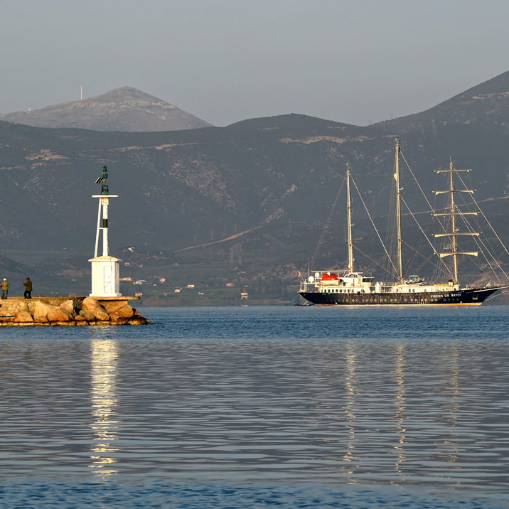 ship near hilly island's harbor