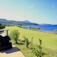 golf cart on coastal golf course 