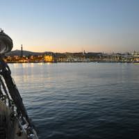 night view of island town coast from ship